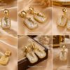 Elegant Gold White Pearl Designer Earrings